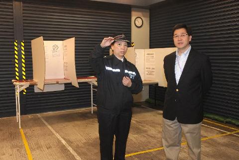 Photograph shows the Secretary for Constitutional and Mainland Affairs, Mr Stephen Lam, visiting the dedicated polling station set up at the Tin Sum Police Station at Hin Keng Street, Sha Tin, New Territories for electors in Tai Wai Constituency who are remanded or detained by law enforcement agencies (other than the Correctional Services Department) this morning.