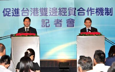 The Secretary for Constitutional and Mainland Affairs, Mr Stephen Lam, and the Deputy Minister of the Mainland Affairs Council, Mr Fu Don-cheng, meet the media after a working meeting in Taipei this afternoon (June 5).