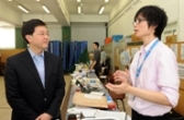 The Secretary for Constitutional and Mainland Affairs, Mr Stephen Lam, this morning (September 6) visited the polling station for the Kwai Tsing District Council Kwai Shing East Estate Constituency by-election set up at the TWGHs Chen Zao Men College at Kwai Hop Street, Kwai Chung. Photo shows Mr Lam chatting with an officer.