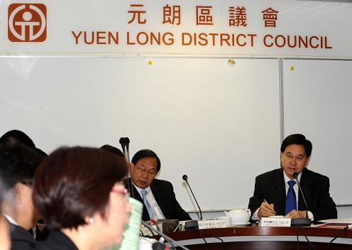 The Secretary for Constitutional and Mainland Affairs, Mr Stephen Lam (right), attends the Yuen Long District Council meeting today (December 10) to discuss the Consultation Document on the Methods for Selecting the Chief Executive and for Forming the Legislative Council in 2012. Mr Lam introduced the consultation document to the District Councillors and listened to their views on the two electoral methods in 2012.