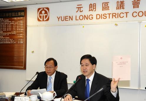 Mr Lam speaks at the Yuen Long District Council meeting today (December 10).