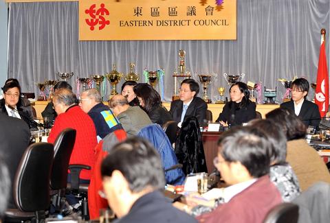 The Secretary for Constitutional and Mainland Affairs, Mr Stephen Lam (third from right), attended the Eastern District Council meeting today (December 18) to discuss the Consultation Document on the Methods for Selecting the Chief Executive and for Forming the Legislative Council in 2012. Photo shows Mr Lam listening to the District Councillors' views on the two electoral methods in 2012.