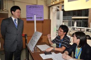 The Secretary for Constitutional and Mainland Affairs, Mr Stephen Lam, visited the Scout Association of Hong Kong - Hong Kong Island Region polling station at Tang Shiu Kin Building, Oi Kwan Road, Wan Chai for the Wan Chai District Council Canal Road Constituency by-election this morning (June 21).