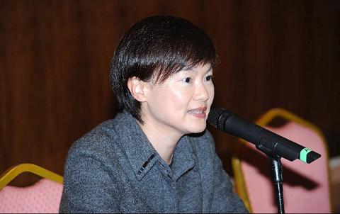 Photo shows Miss Wong speaking at the forum.