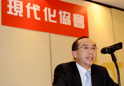 Photo shows Mr Ho speaking at the forum.