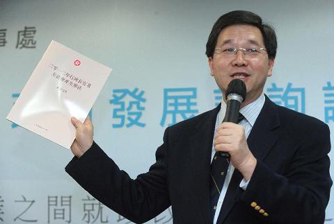 Photo shows Mr Lam introducing the consultation document.