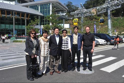 The HKSAR Government delegation continued its visit programme in Taichung City and its vicinity today (March 6). They made several stops in Nantou County to see for themselves the services and facilities at the tourist sites. Photo shows members of the delegation (from left to right) the Permanent Secretary for Commerce, Industry and Technology (Commerce and Industry), Miss Yvonne Choi; the Secretary for Commerce and Economic Development, Mrs Rita Lau; the Secretary for Constitutional and Mainland Affairs, Mr Stephen Lam; Mrs Lam; the Commissioner for Tourism, Mr Philip Yung; and the Deputy Secretary for Constitutional and Mainland Affairs, Mr Howard Chan, outside the Sun Moon Lake Cable Car.