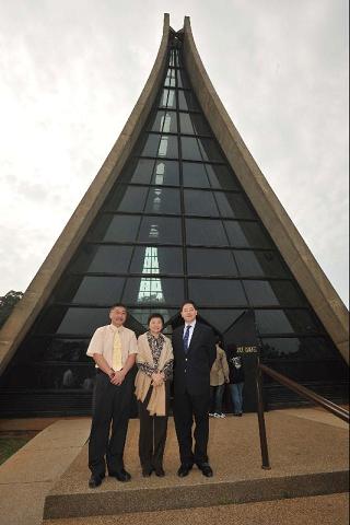 Photograph shows the Secretary for Constitutional and Mainland Affairs, Mr Stephen Lam (right), and the Secretary for Commerce and Economic Development, Mrs Rita Lau (centre), outside the Luce Chapel designed by I. M. Pei during their visit to Tunghai University. Accompanying them is the University's Director, Office of Public Relations, Mr Benjamin Shen (left).