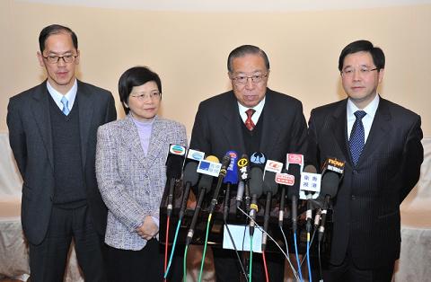 The ECCPC Chairman, Mr Charles Lee Yeh-kwong (second right); the Secretary for Constitutional and Mainland Affairs, Mr Stephen Lam (right), as Executive Vice-Chairperson; and the two Vice-Chairpersons - the Secretary for Home Affairs, Mr Tsang Tak-sing (left); and the Secretary for Commerce and Economic Development, Mrs Rita Lau (second left); meet the media after the luncheon.