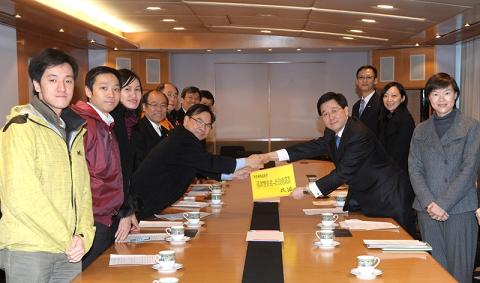 Photo shows Mr Lam receiving a submission from representatives of the Hong Kong Association for Democracy and People's Livelihood. He is accompanied by the Under Secretary for Constitutional and Mainland Affairs, Miss Adeline Wong (right).