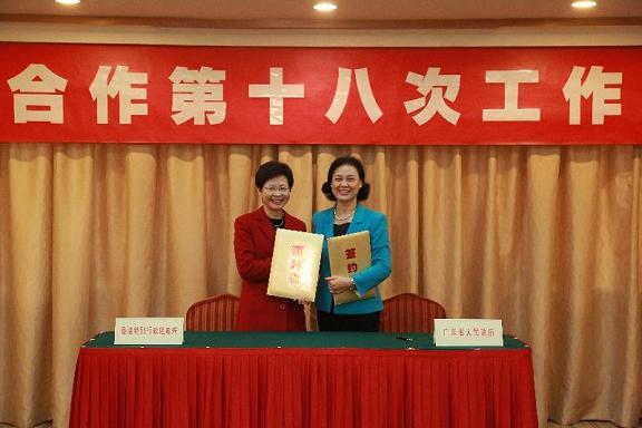 Mrs Lam (left) and Ms Zhao photographed after the signing ceremony.