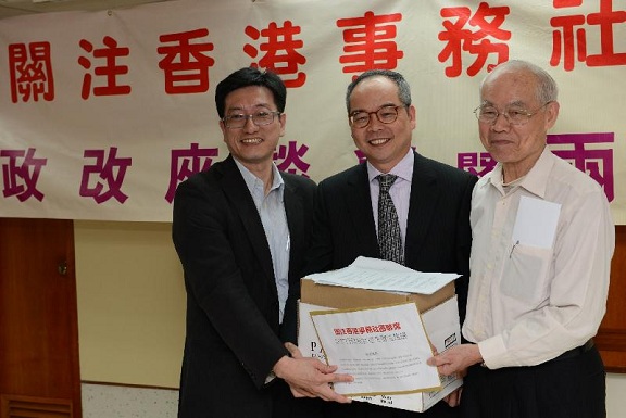 Mr Lau receives the submissions on constitutional development by the organisations.