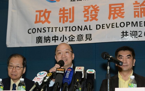 The Secretary for Constitutional and Mainland Affairs, Mr Raymond Tam, and the Under Secretary for Commerce and Economic Development, Mr Godfrey Leung, attended a constitutional development consultation session organised by the HKSME Forum to exchange views with participants on the "Consultation Document on the Methods for Selecting the Chief Executive in 2017 and for Forming the Legislative Council in 2016" this morning (April 23). Photo shows Mr Tam (centre) speaking at the consultation session.