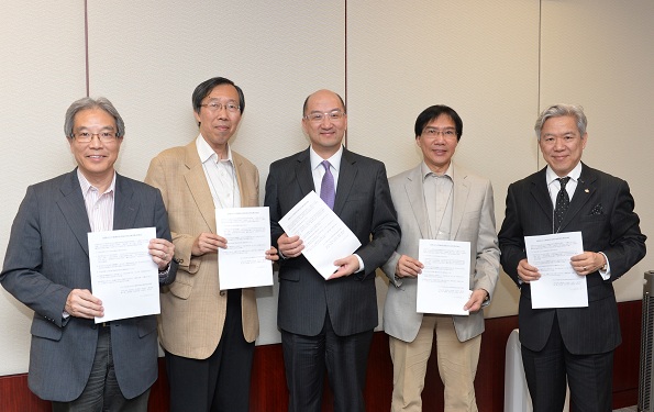 The Secretary for Constitutional and Mainland Affairs, Mr Raymond Tam (centre), meets with Christian representatives of the religious subsector of the Election Committee to exchange views on the "Consultation Document on the Methods for Selecting the Chief Executive in 2017 and for Forming the Legislative Council in 2016" this afternoon (May 2). Photo shows Mr Tam receiving their submission on constitutional development.