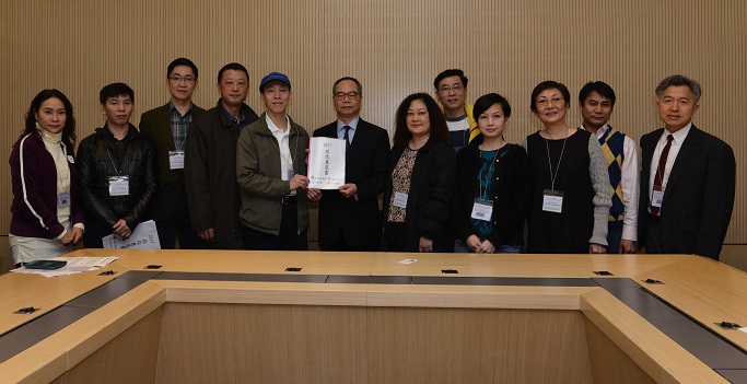 The Under Secretary for Constitutional and Mainland Affairs, Mr Lau Kong-wah, met with representatives of the Defend Hong Kong Campaign, Virtue Dynamics, Voice of Harmony and Guardian of Hong Kong this morning (March 3) to hear their views on the "Consultation Document on the Method for Selecting the Chief Executive by Universal Suffrage". Picture shows Mr Lau (sixth left) receiving submissions on constitutional development.