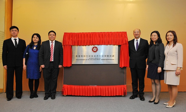 Mr Tam (third right) pictured with staff of the LLU, Ms Foo (second right) and Mr Tung (third left).