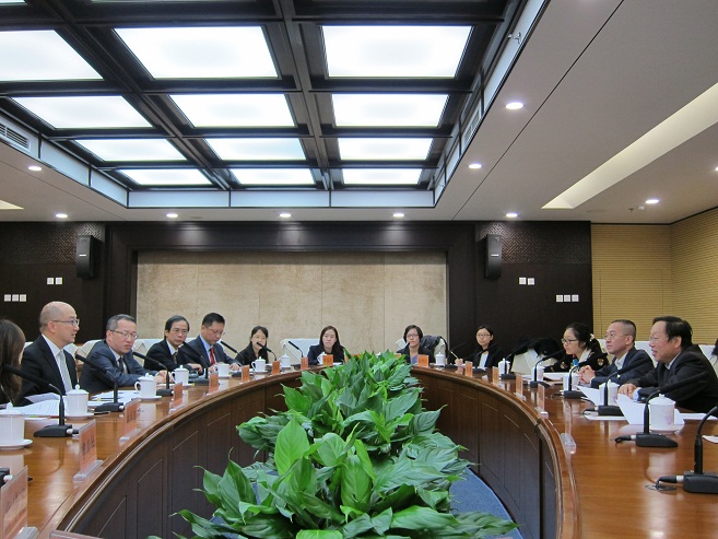The Secretary for Constitutional and Mainland Affairs, Mr Raymond Tam, leads a delegation of the Hong Kong Special Administrative Region Government (HKSARG) to conduct the annual reciprocal visit between the HKSARG and the Ministry of Foreign Affairs (MFA) in Beijing today (October 12). The delegation visited the Ministry of Culture this afternoon to understand the work of Ministry. Photo shows Mr Tam (first left) and delegation members exchanging views with the Director General of the Office of Hong Kong, Macao and Taiwan Affairs of the Ministry of Culture, Mr Xie Jinying (first right), and his colleagues.