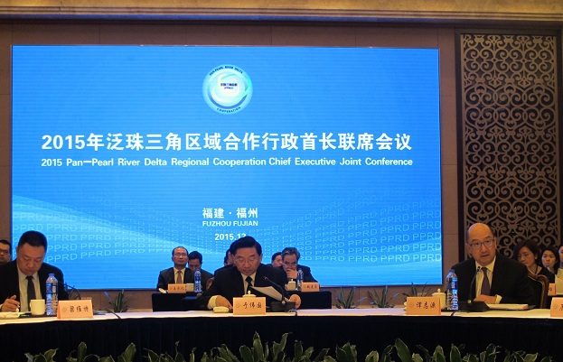 The Secretary for Constitutional and Mainland Affairs, Mr Raymond Tam (right), attends an interactive discussion with government leaders of the PPRD provinces/regions at the 2015 Pan-Pearl River Delta (PPRD) Regional Co-operation Chief Executive Joint Conference in Fuzhou this morning (December 11).