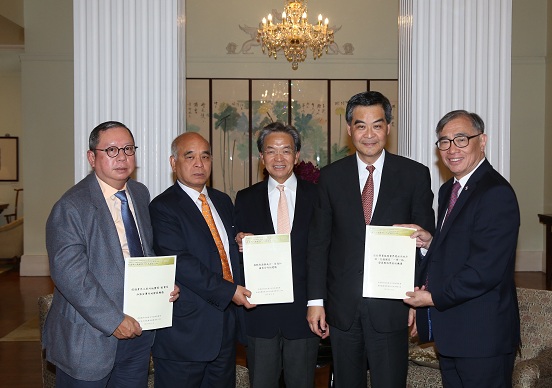 The Consultative Committee on Economic and Trade Co-operation between Hong Kong and the Mainland submitted a number of proposals on promoting economic and trade co-operation between Hong Kong and the Mainland to the Chief Executive today (December 11). Picture shows the Chairman of the Committee, Mr Jack So (centre); the Chairman of the Trade Liberalisation and Investment Facilitation Sub-group, Dr Henry Cheng (second left); the Chairman of the Development of the Mainland Market by Professional Services Sub-group, Dr Joseph Lee (first right); and the Chairman of the Employment and Development Prospects of Youth in the Mainland Sub-group, Dr Peter Lam (first left), submitting the proposals to the Chief Executive, Mr C Y Leung (second right).