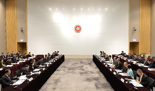 The Chief Secretary for Administration, Mrs Carrie Lam (sixth right), and the Vice-Governor of Guangdong Province, Mr He Zhongyou (sixth left), co-chair the 21st Working Meeting of the Hong Kong/Guangdong Co-operation Joint Conference at the Central Government Offices, Tamar, this morning (March 23).