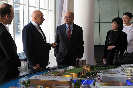 The Secretary for Constitutional and Mainland Affairs, Mr Raymond Tam, started his duty visit to Shanghai, Jinan and Beijing today (April 19). Photo shows Mr Tam (centre) visiting the show suite of a large-scale development project in Shanghai and being briefed on its planning and construction progress.