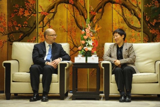 The Secretary for Constitutional and Mainland Affairs, Mr Raymond Tam (left), meets with the Vice Governor of Shandong Provincial Government, Ms Wang Suilian, this morning (April 21) in Jinan, Shandong Province to exchange views on stepping up exchanges and co-operation between the two places.