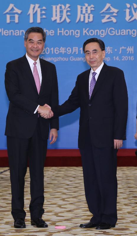 The Chief Executive, Mr C Y Leung, led the Hong Kong Special Administrative Region Government delegation to attend the 19th Plenary of the Hong Kong/Guangdong Co-operation Joint Conference in Guangzhou today (September 14). Photo shows Mr Leung (left) shaking hands with the Governor of Guangdong Province, Mr Zhu Xiaodan (right), before the Plenary.