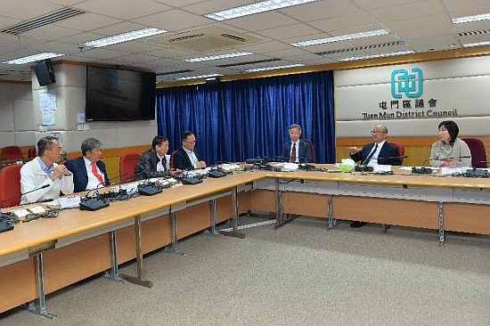 The Secretary for Constitutional and Mainland Affairs, Mr Raymond Tam (second right), meets with representatives of the Tuen Mun District Council this afternoon (December 6) to learn more about issues relating to the district.