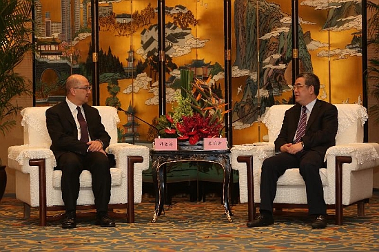 The Secretary for Constitutional and Mainland Affairs, Mr Raymond Tam (left), meets with the Vice Governor of the Sichuan Provincial Government, Mr Zhu Hexin, in Chengdu today (June 11).