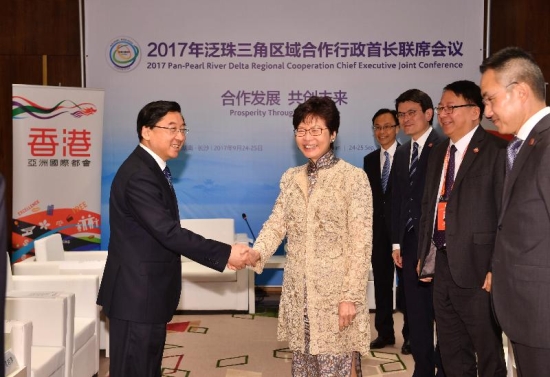 The Chief Executive, Mrs Carrie Lam, and the Governor of Fujian Province, Mr Yu Weiguo, held a bilateral meeting while attending the 2017 Pan-Pearl River Delta Regional Cooperation Chief Executive Joint Conference in Changsha, Hunan Province, today (September 25). Mrs Lam (second left) is pictured shaking hands with Mr Yu (first left) before the bilateral meeting. Looking on are the Secretary for Commerce and Economic Development, Mr Edward Yau (third right); the Secretary for Constitutional and Mainland Affairs, Mr Patrick Nip (fourth right); the Director of the Chief Executive's Office, Mr Chan Kwok-ki (second right); and the Permanent Secretary for Constitutional and Mainland Affairs, Mr Roy Tang (first right).