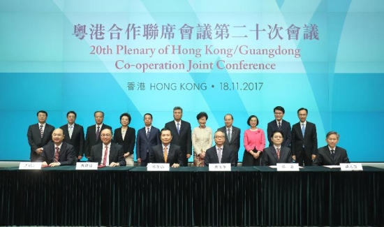The Chief Executive, Mrs Carrie Lam, led the Hong Kong Special Administrative Region Government delegation to attend the 20th Plenary of the Hong Kong/Guangdong Co-operation Joint Conference in the Central Government Offices today (November 18). Photo shows (from back row, fourth left) Deputy Director of the Liaison Office of the Central People's Government in the Hong Kong Special Administrative Region Ms Qiu Hong; Deputy Director of the Hong Kong and Macao Affairs Office of the State Council Mr Huang Liuquan; the Governor of Guangdong Province, Mr Ma Xingrui; Mrs Lam; the Chief Secretary for Administration, Mr Matthew Cheung Kin-chung; and other officials from both sides witnessing the signing of agreements on co-operation between Hong Kong and Guangdong.